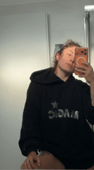 Woman takes bathroom mirror selfie in Kiryat Bialik