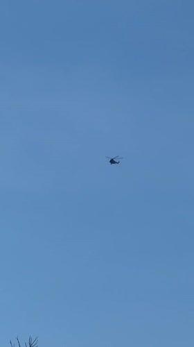 Helicopter spotted flying over Adlerskiy, Russia on clear morning