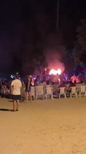 Neon-lit beach bar night scene in Ao Nang