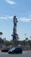 Colorful abstract sculpture spotted at Barcelona roundabout on sunny morning