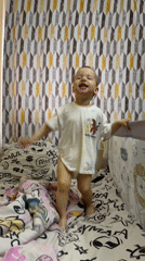 Toddler in dinosaur shirt spotted in Russian bedroom