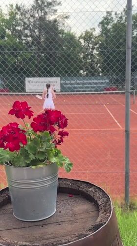 Afternoon tennis at TC Neubiberg, clay courts and garden details