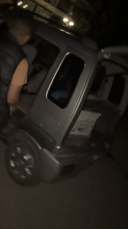 Person enters silver car through trunk in Nova Kamena