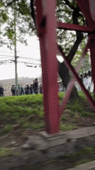 Riot police form line facing civilians in Mexico City