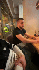 Two men dine at restaurant in Burgas, Bulgaria