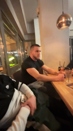 Two men dine at restaurant in Burgas, Bulgaria