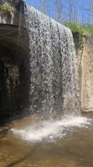 Waterfall documented flowing from concrete structure in Ovoshtnik, Bulgaria