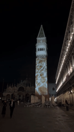 Light projection displays on Venice's St. Mark's Campanile at night
