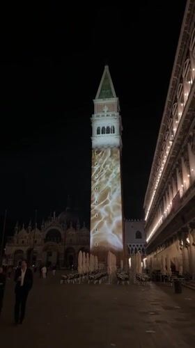 Light projection displays on Venice's St. Mark's Campanile at night