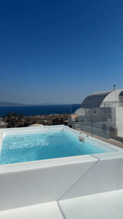 Morning jacuzzi view captured overlooking Aegean Sea in Santorini