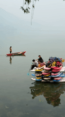 Paddle boarders create floating structure on Pokhara lake