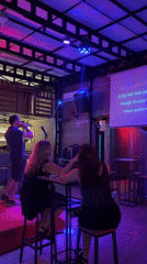 Evening entertainment captured at Đà Nẵng bar with karaoke, pool