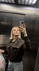 Woman films selfies in Russian elevator early morning