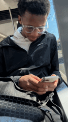 Commuter uses phone on Strasbourg public transport