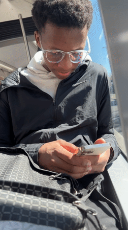 Commuter uses phone on Strasbourg public transport