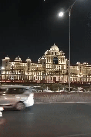 Ornate domed building illuminated at night in Hyderabad