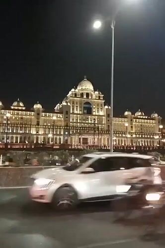 Ornate domed building illuminated at night in Hyderabad