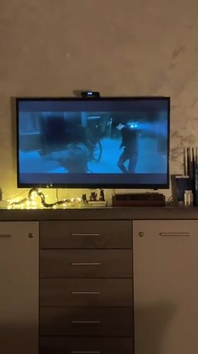 Dark fantasy film plays on TV in Montenegro bar