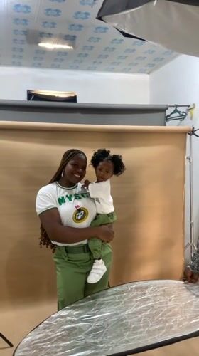 Photography session captures NYSC member with child in Nigeria