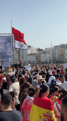 Outdoor cultural event on Tangier's waterfront with live music and mariachi