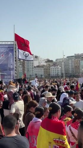 Outdoor cultural event on Tangier's waterfront with live music and mariachi