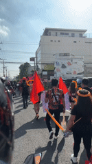 Street parade with flags, balloons disrupts Davao City traffic