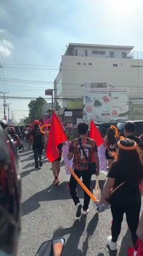Street parade with flags, balloons disrupts Davao City traffic