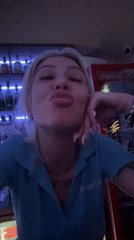 Woman poses at busy restaurant in Plovdiv, Bulgaria