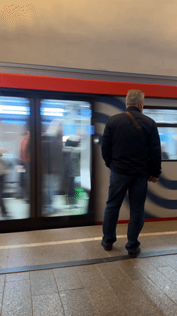 Morning commuters observed at Moscow's Novokuznetskaya metro station