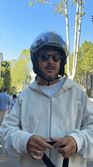 Motorcyclist spotted helmet-up, riding scooter in downtown Tbilisi