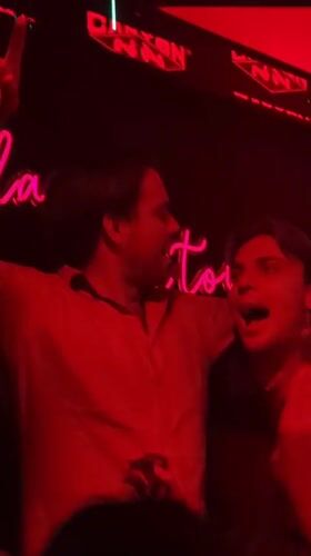 Club scene captured in Liangjiang with dancing crowd