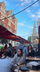 Evening dining scene captured at London pub outdoor seating