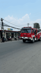 Fire truck responds through commercial district in Kathmandu