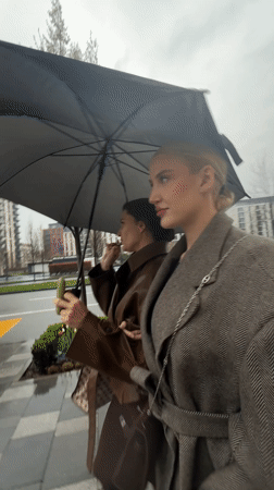 Person takes mirror selfie in Belgrade elevator