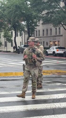 National Guard soldiers deployed on rainy Washington street