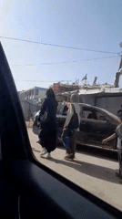 Street life documented in Khan Yunis during afternoon hours