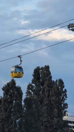Constanța's cable cars, streets, and Mamaia resort on a July afternoon