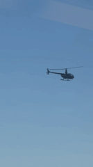 Helicopter, cyclist spotted along Tagus estuary in Oeiras