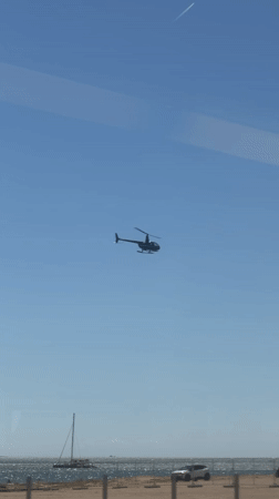 Helicopter, cyclist spotted along Tagus estuary in Oeiras