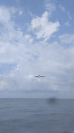 Planes on final approach over Batumi's Black Sea coastline