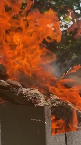 Fire burns in metal container in Shcholkine, Ukraine