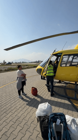 Woman observed at Kathmandu helipad under clear skies
