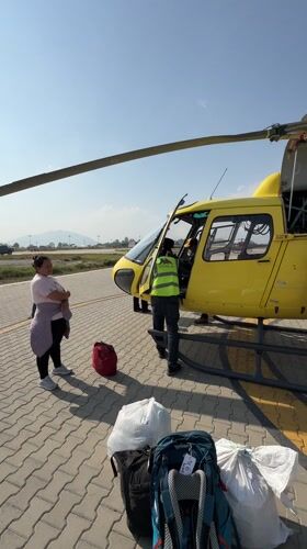 Woman observed at Kathmandu helipad under clear skies