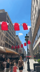 Arsenal jerseys decorate Budapest streets during sunny afternoon