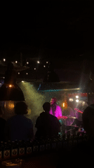 Live band performs at dimly lit bar in Шебунино
