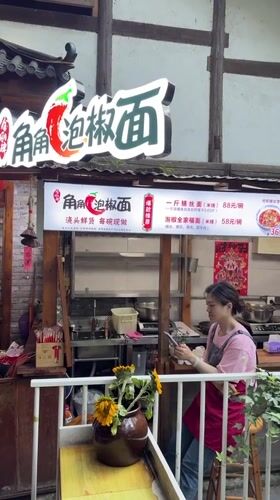 Outdoor restaurant bustling with diners in Beibei, China