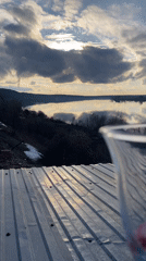 Child plays outdoors on overcast day in rural Russia
