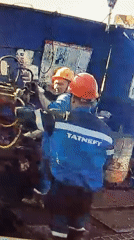 TATNEFT workers operate machinery in Novyi Menzelyabash, Russia