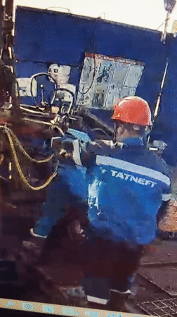 TATNEFT workers operate machinery in Novyi Menzelyabash, Russia
