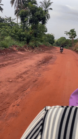 Rural dirt road journey documented in Opu, Nigeria